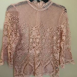 Cute lace top with zipper back, size M
